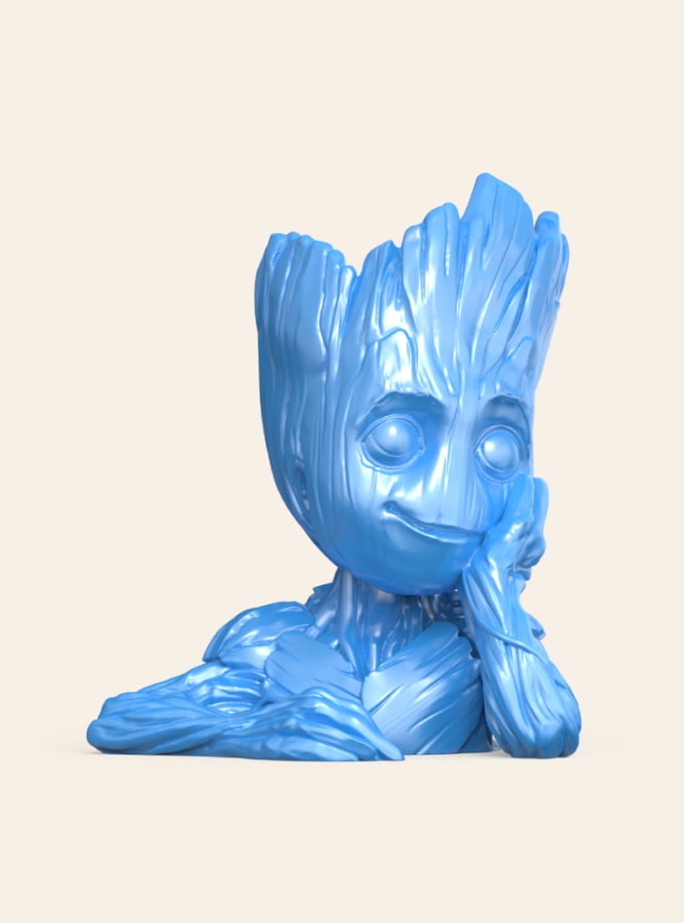groot-young-3d-model-zbrush 3D model of a young Groot character with large eyes and a textured surface.