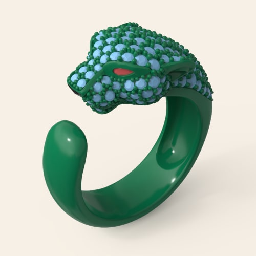 panther-head-ring-3d-model 3D render of a panther head ring with blue pave stones and an open band.